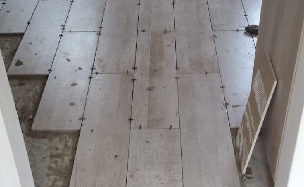 preparation for floor tiling.